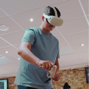 A person with a VR headset on, exploring their kitchen design in 3D